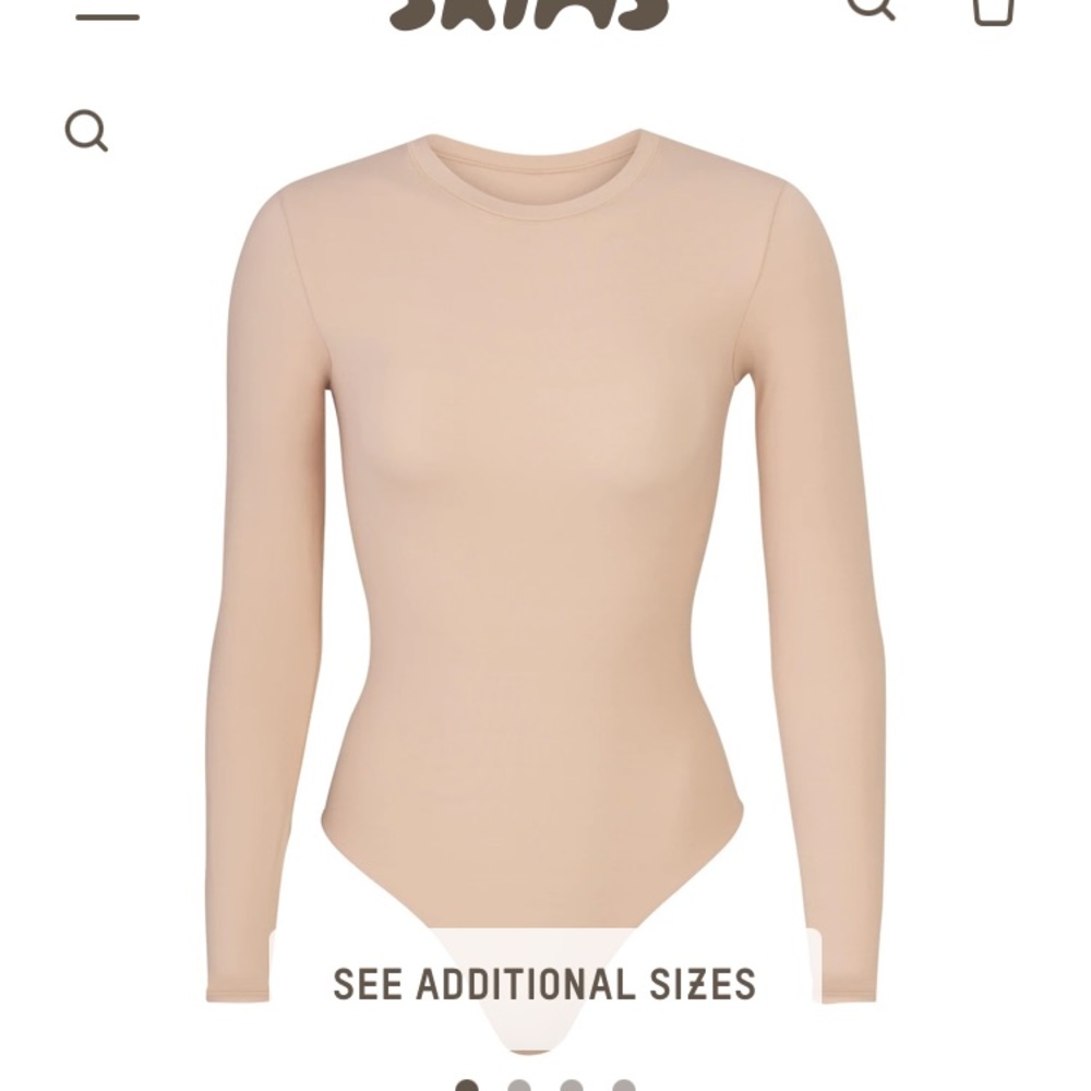 Fits everybody long sleeve crew neck bodysuit in size Xs in color mica